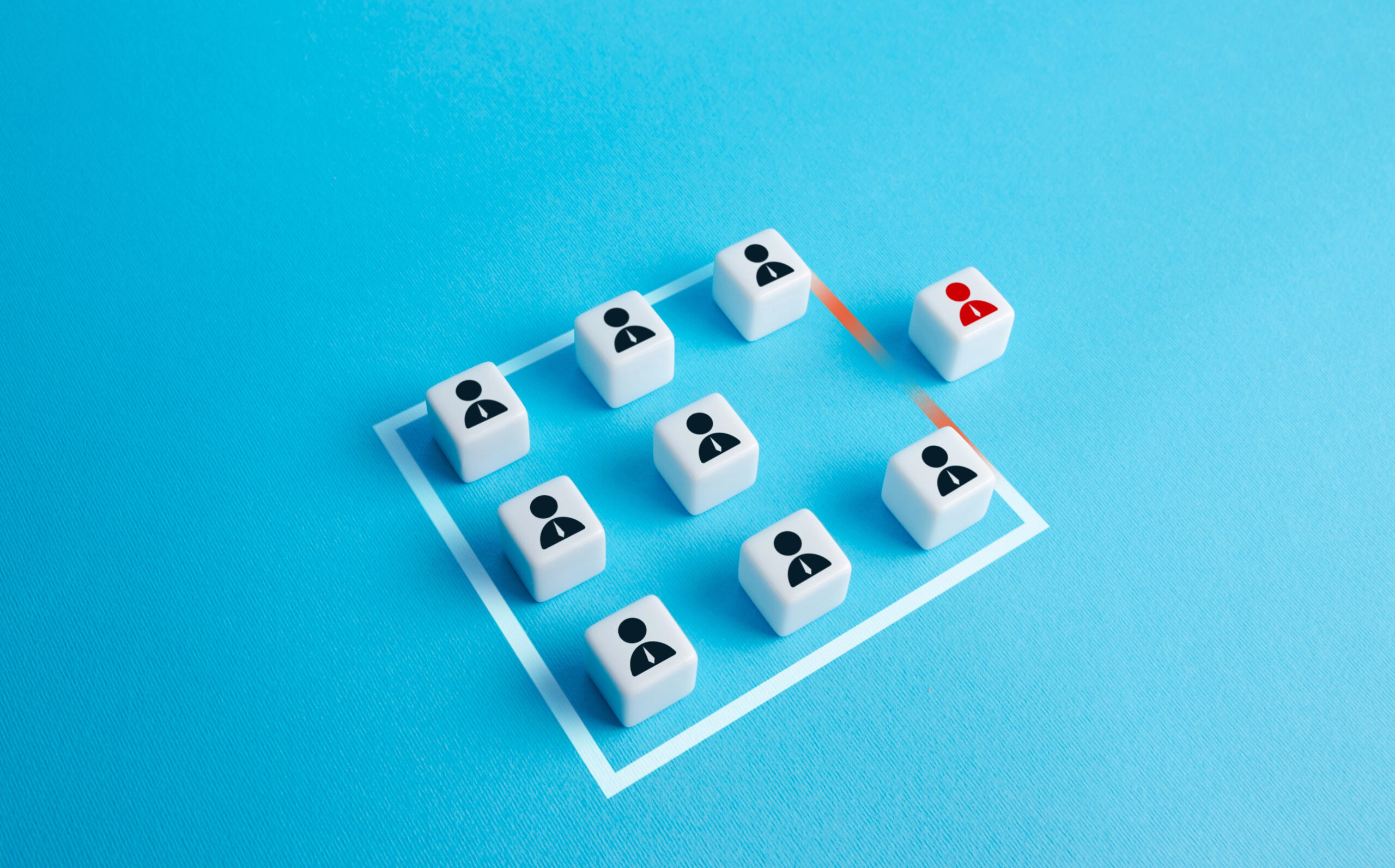 A group of people blocks with one leaving shows the disruption frequent turnover can cause your organization.
